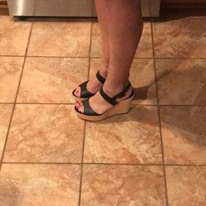 Stylish black JCrew wedges in a size 9.